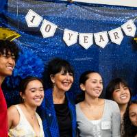 President Mantella with Asian students